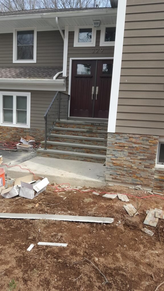 Exterior stone steps built during a property improvement project