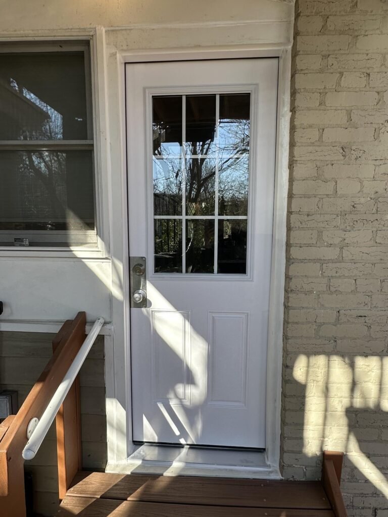 Installed door with finished trim work